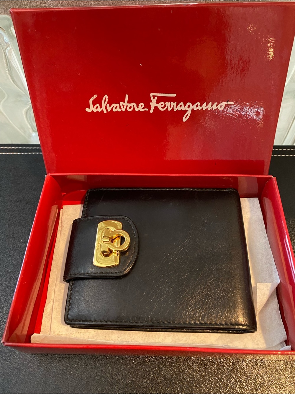 Salvatore Ferragamo Black Calfskin Leather Men’s Wallet. Gold-tone Gancini Clasp